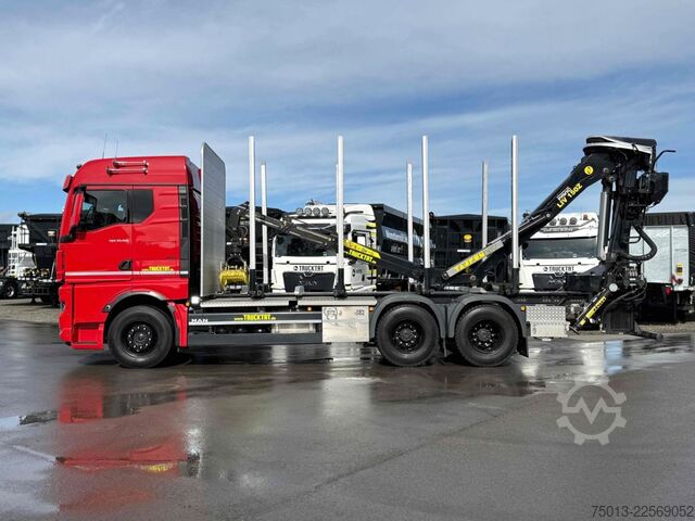 Truk pengangkut kayu MAN TGX 33.510 BL CH 6X4 mit TajfunLIV 150Z96,MIETE?