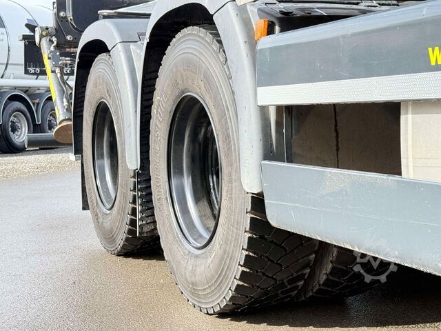 Truk pengangkut kayu MAN TGX 33.510 BL CH 6X4 mit TajfunLIV 150Z96,MIETE?