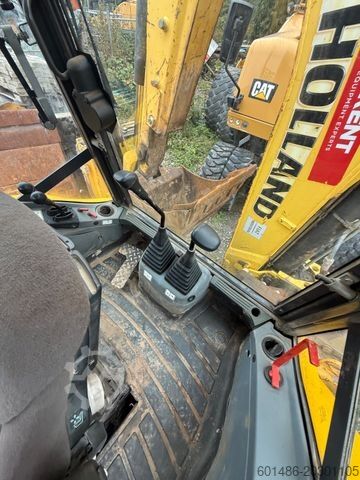 Traktorgravemaskin NEW HOLLAND B 115 c