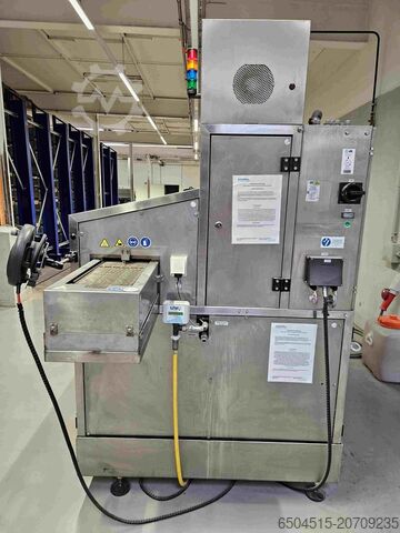 Aqueous-based degreasing machine  