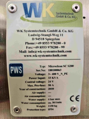 Aqueous-based degreasing machine