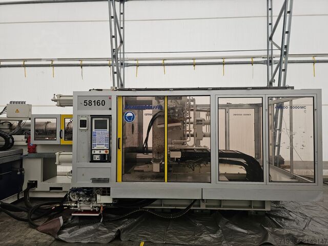 Machine de moulage par injection Krauss Maffei KM 800-5000 MC
