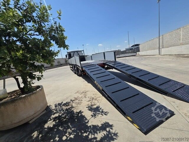 Truk flatbed pengangkut mesin MAN TGS 26.360