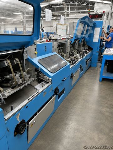 Binder with collating machines Müller Martini Corona 3010 C15-31