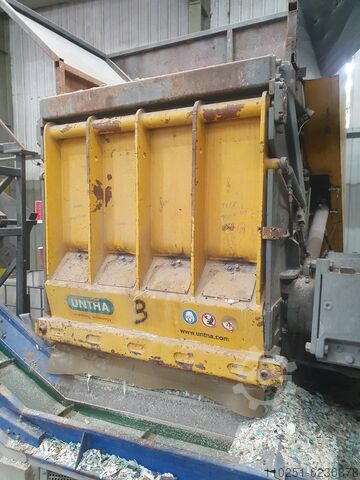 Untha shredder with conveyor and magnet 