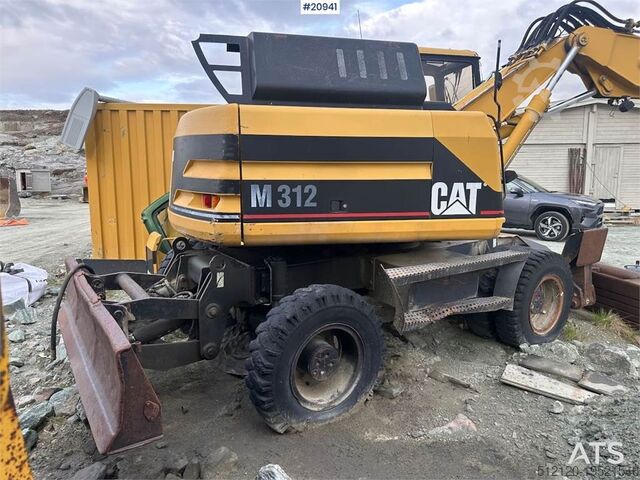 Bager na točkovima Caterpillar 312