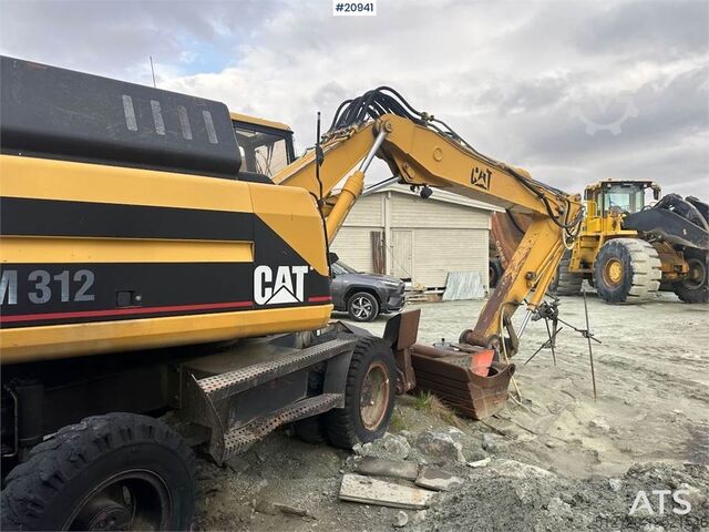 Bager na točkovima Caterpillar 312