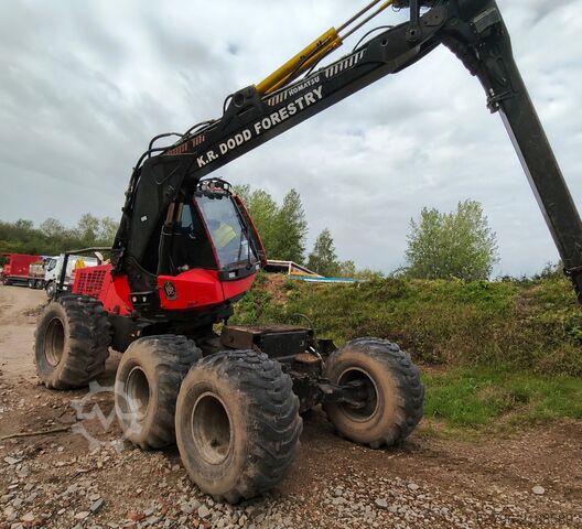 Penuai dengan Kepala Penuai Komatsu 941.1