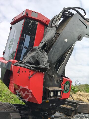 Penuai dengan Kepala Penuai Komatsu 941.1