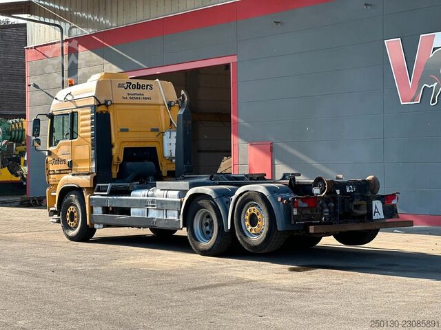 Kamion s kipom s pomičnim kontejnerom MAN TGA 26.480 6x2-2 BL VDL S-21 Schubarm AK