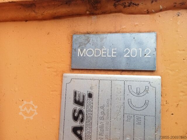 Kolové rypadlo Case WX95 with 4 excavator buckets and forks