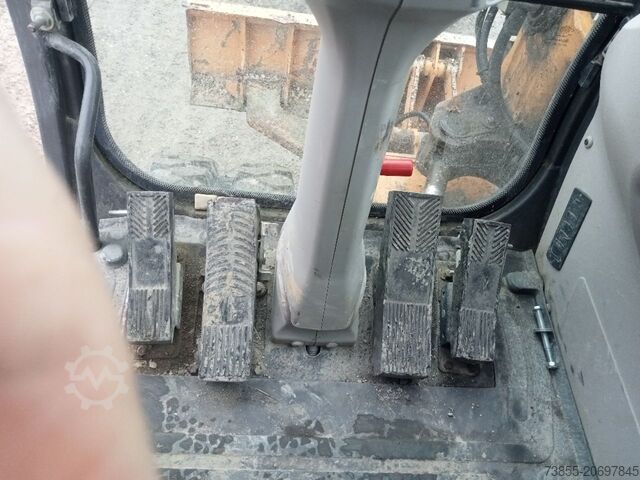 Kolové rypadlo Case WX95 with 4 excavator buckets and forks