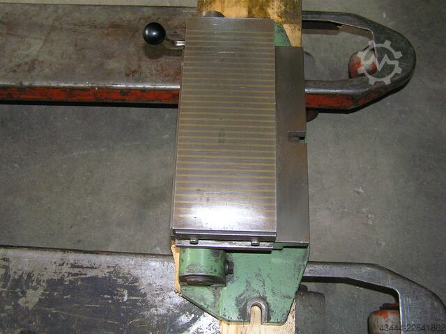 Magnetic clamping plate  