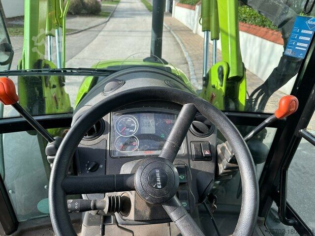 Traktori Claas Axos 310 mit Frontlader FL80