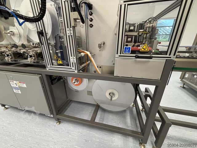 Sistema personalizado de procesamiento de tiras Kinematic Automation Inc. C7100 Reel to Strip Laminator