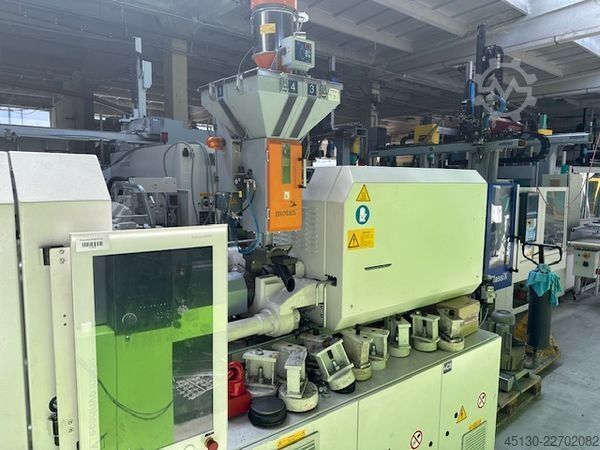  KraussMaffei KM 81-380 PX mit dem Roboter Sepro Indus