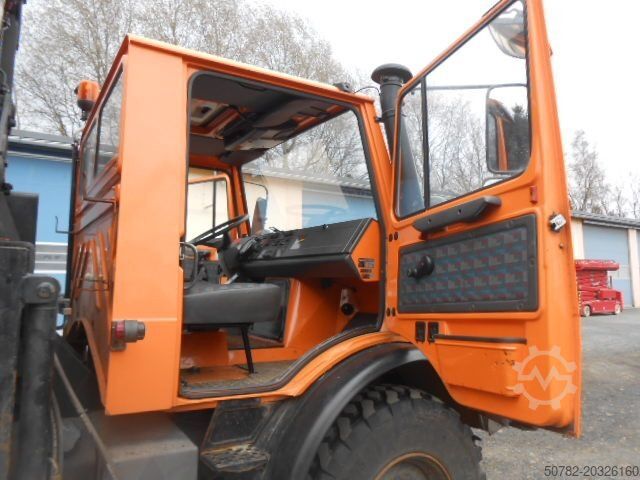 Camion benne UNIMOG U1450 427/11 mit Kran