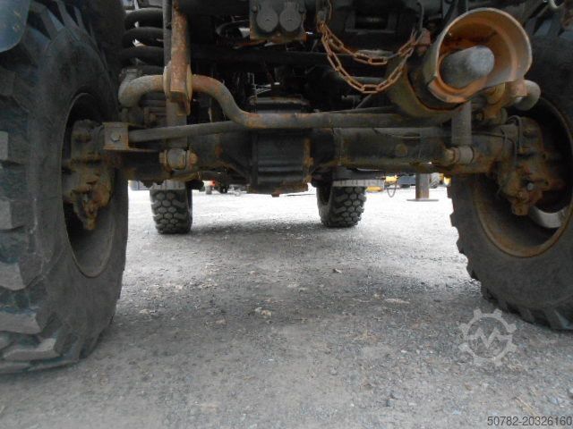Camion benne UNIMOG U1450 427/11 mit Kran