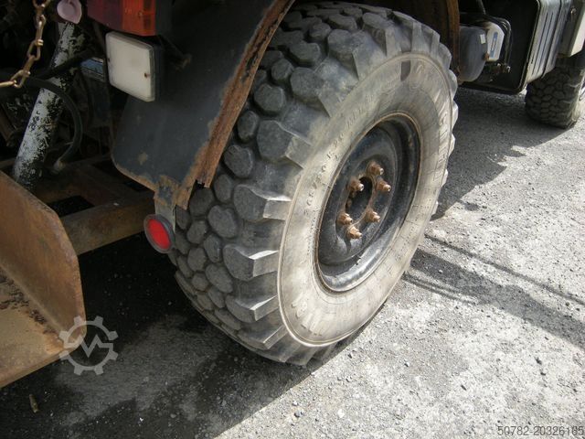 Dreiseitenkipper MERCEDES-BENZ Unimog U1250 mit Kran MKG 105