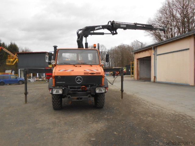 Camión volquete MERCEDES-BENZ U1450 427/11 mit Kran