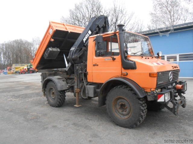 Camión volquete MERCEDES-BENZ U1450 427/11 mit Kran