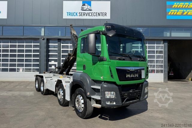 Kanca kasalı yük kamyonu (roll-off) MAN TGS 35.480 8x4 Moser