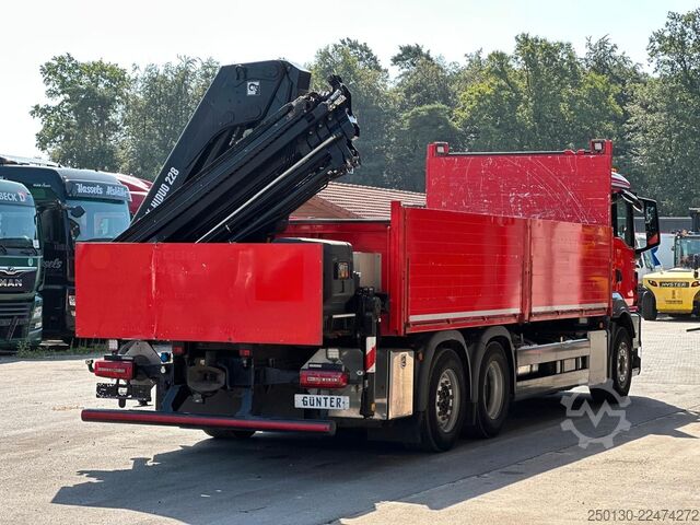 Flatbed truck MAN TGS 26.430 6x2LL Baustoffp./ HIAB 228 Lenk/Lift