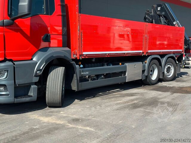Flatbed truck MAN TGS 26.430 6x2LL Baustoffp./ HIAB 228 Lenk/Lift