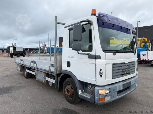 Flatbed truck MAN TGL 10.180 4x2 Flatbed 6,,80 m. Euro 3