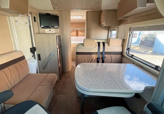 Autorulotă semi-integrată BÜRSTNER Ixeo T 734 - Hub/Queensbett - Klima -