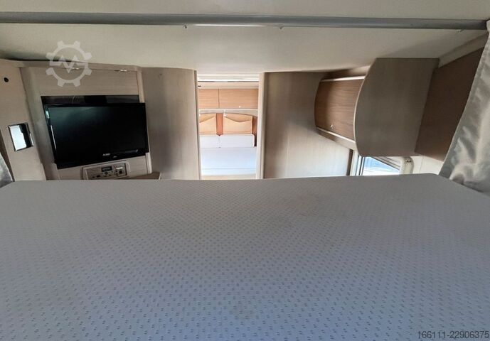 Autorulotă semi-integrată BÜRSTNER Ixeo T 734 - Hub/Queensbett - Klima -