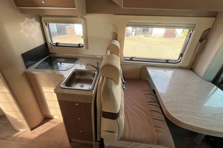 Autorulotă semi-integrată BÜRSTNER Ixeo T 734 - Hub/Queensbett - Klima -