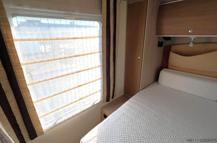 Autorulotă semi-integrată BÜRSTNER Ixeo T 734 - Hub/Queensbett - Klima -