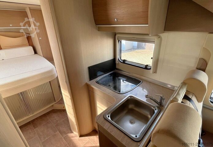Autorulotă semi-integrată BÜRSTNER Ixeo T 734 - Hub/Queensbett - Klima -