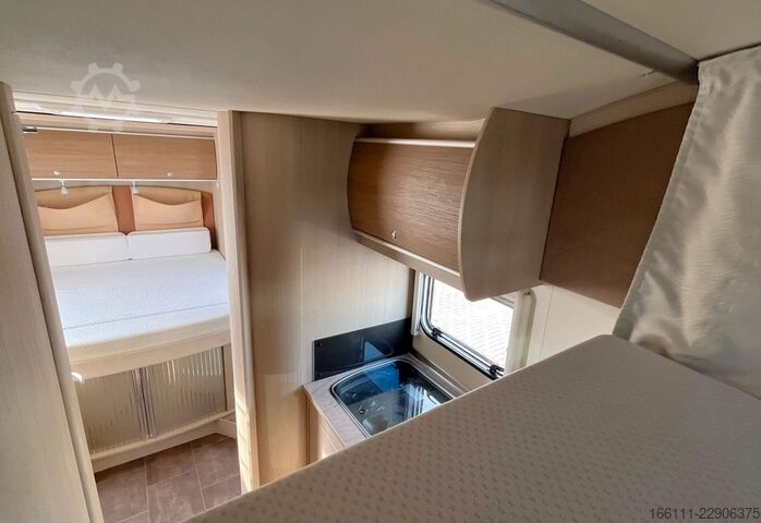 Autorulotă semi-integrată BÜRSTNER Ixeo T 734 - Hub/Queensbett - Klima -