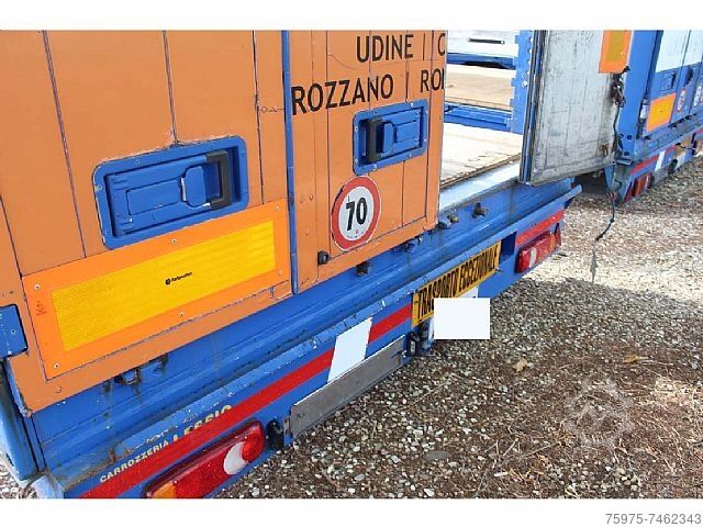 Građevinski strojevi s niskim utovarivačem Meusburger semirimorchio centinato ribassato buche usato