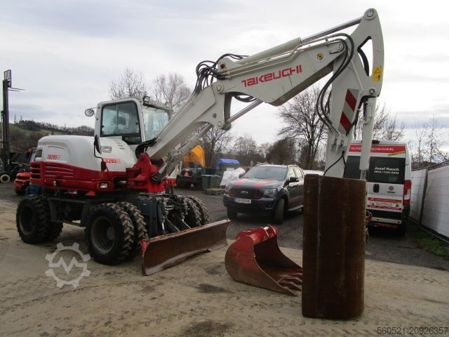 мобільний екскаватор Takeuchi TB 295W - POWERTILT + Schnellw + 3 Löffel