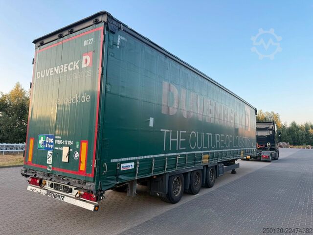 Trailer semi terbuka dengan terpal SCHMITZ CARGOBULL SCB*S3T MegaTrailer Curtainsider Edscha