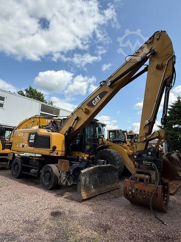 Excavadora móvil CATERPILLAR MH 3022 Hochfahrbare Kabine inkl Greifer