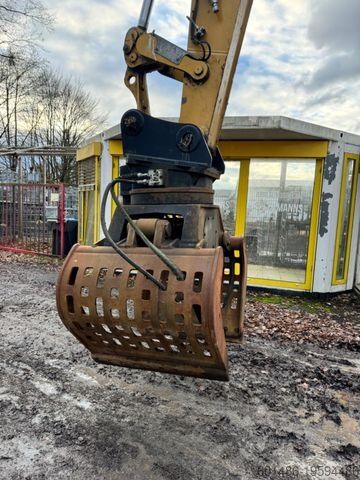 Hjólagröfur CATERPILLAR MH 3022 Hochfahrbare Kabine inkl Greifer