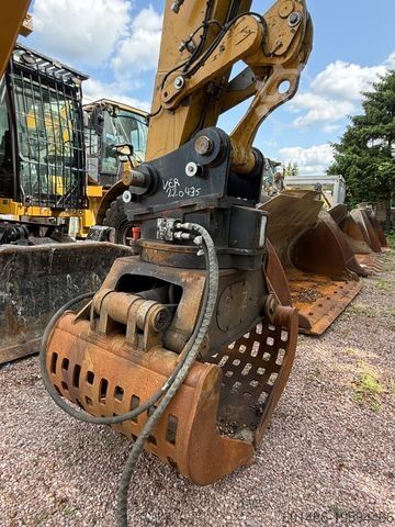 Hjólagröfur CATERPILLAR MH 3022 Hochfahrbare Kabine inkl Greifer