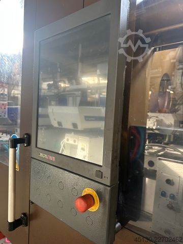 Machine de moulage par injection KraussMaffei KM 250-2000 CX Blue Power mit dem Robote