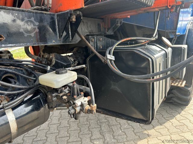 Flutningabíll með sléttu pallrými UNIMOG U 427 4x4 / Kran Atlas 130 / Winde