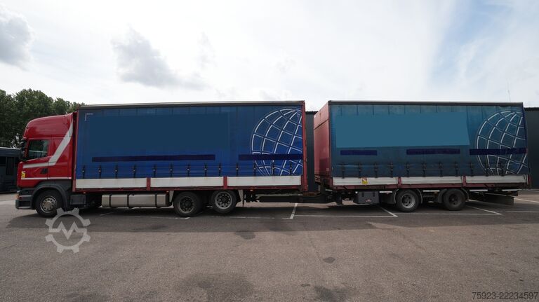 Schuifzeil Scania R 400 6x2 curtainside in combo with Burg trailer
