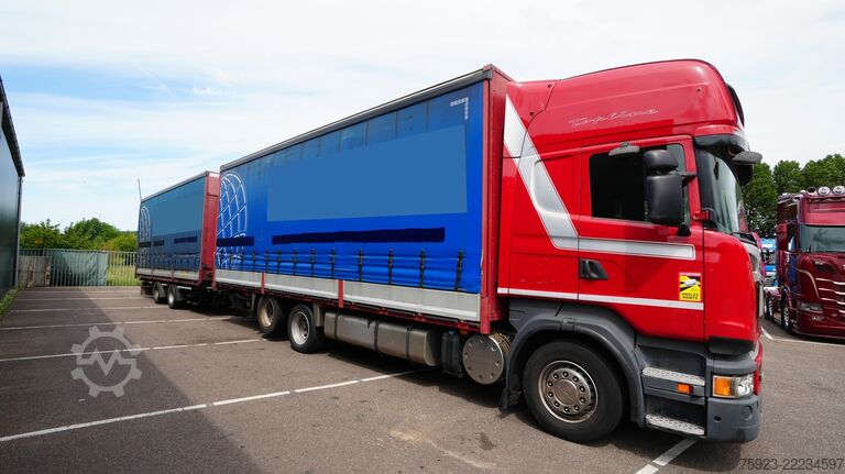 Schuifzeil Scania R 400 6x2 curtainside in combo with Burg trailer