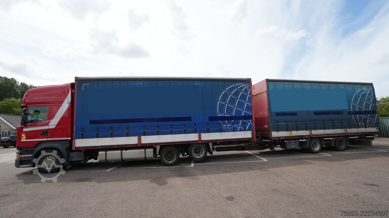 Schuifzeil Scania R 400 6x2 curtainside in combo with Burg trailer
