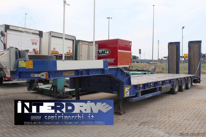 Semirremolque de plataforma baja para el transporte de maquinaria de construcción komodo carrellone rampe verricello usato