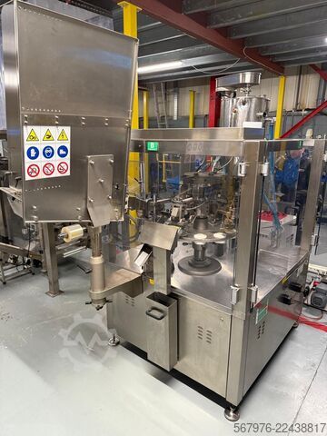 Complete tube filling and sealing system Complete Axomatic Tube Filling and Sealing System
