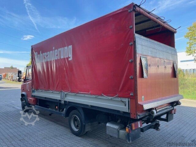 Transportador con plataforma y toldo Mercedes-Benz 814 D Vario mit LBW 4x2