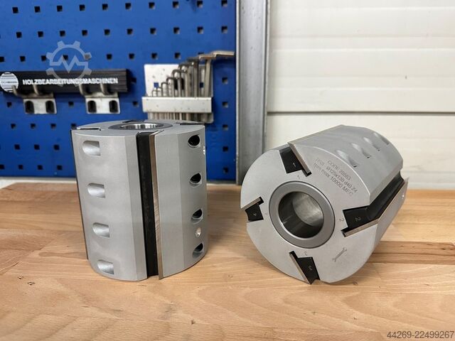 Planer head for strip planer blades  